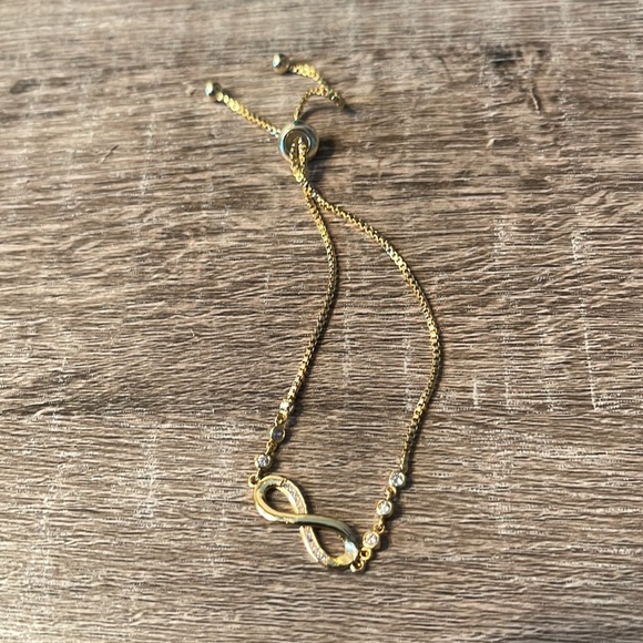 Gold Infinity bracelet with CZ sparkly stones NWOT Toggle adjustable - Picture 4 of 8